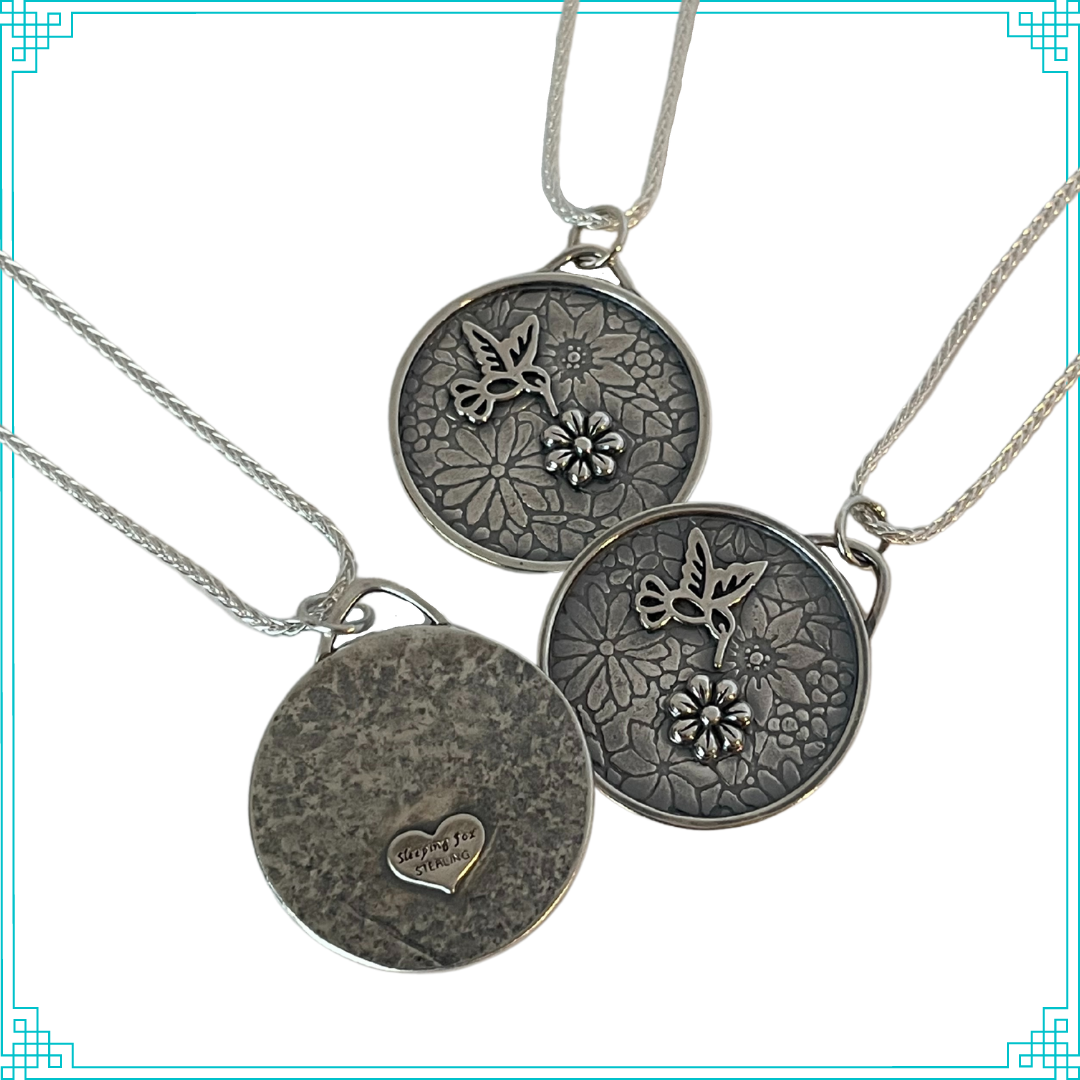 Sleeping Fox handmade silver jewelry creates this hummingbird drinking flower-nectar pendant with sterling silver 18' wheat chain (front and back side pictured).