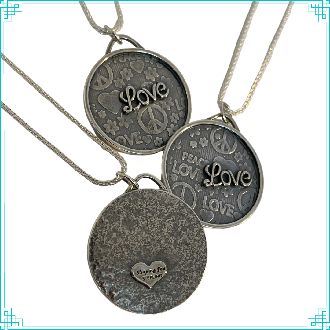Sleeping Fox silver jewelry pendant with Peace and Love background and raised Love script lettering, hanging from 18' wheat chain (front and back view).