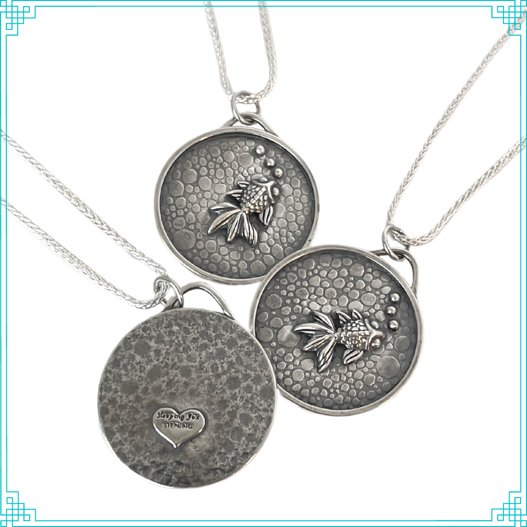 Sleeping Fox handmade silver jewelry pendant features a fish with bubbles swimming in a pebbled cement pond (front and back sides).