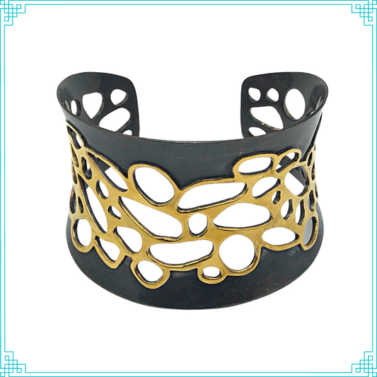 Sleeping Fox quality handmade jewelry presents Pathways Cuff Bracelet. This bracelet has a wonderful comfort fit due to it's anticlastic shape. Anticlastic means the material has a curve going in two different directions. The base material is copper and the top element is brass. The whole piece has been given a patina of black and the patina has been polished off the brass.