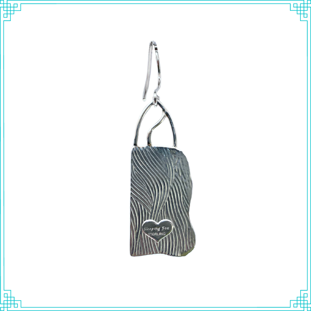 Sleeping Fox quality handmade sterling silver jewelry presents Divided. This is the back of the earrings, featuring a wavy textured flowing design in the metal with the Sleeping Fox hallmark.