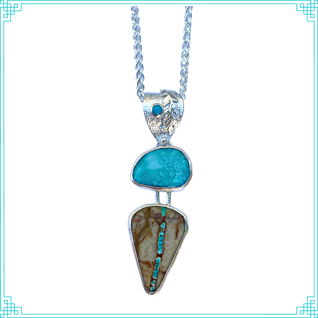 Sleeping Fox quality handmade sterling silver jewelry presents Three Turquoise Pendant. This sterling silver pendant gets its name from the three turquoise stones. If you collect ribbon turquoise, this native Nevada stone will make a great addition to your collection. The rare and unique ribbon turquoise leads your eye up to the brilliance of the middle turquoise. The vine accented bail with 3mm turquoise allows the bottom two stones to swing.