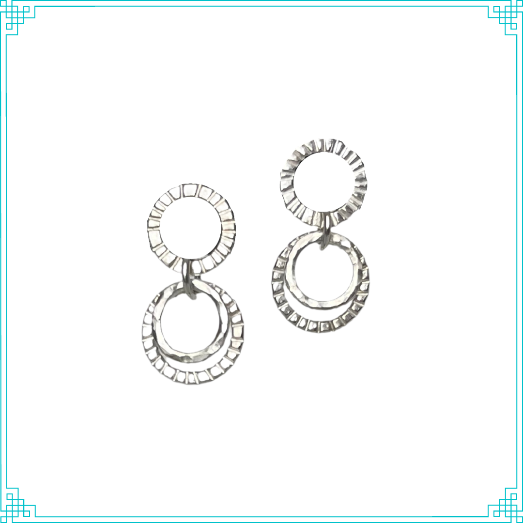 Sleeping Fox sterling silver handmade post earrings feauture 3 textured rings, one above and two below.